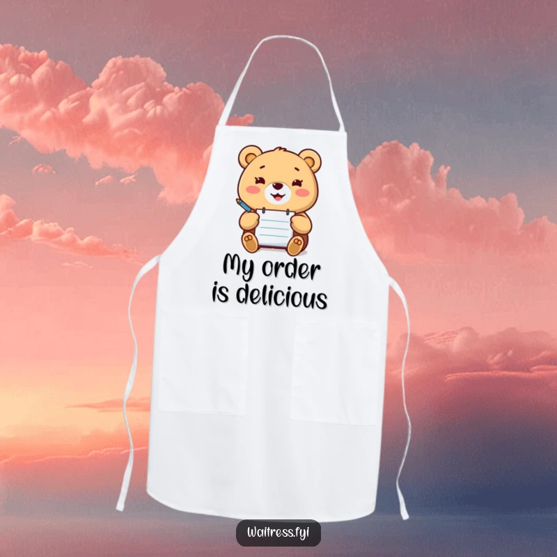Funny Kawaii bear apron showing a happy bear with a notepad and pen, ready to take orders, great for cooking.