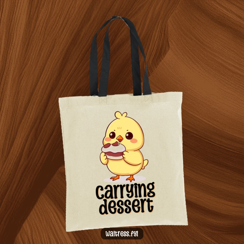 Funny determined chick character presenting a small, wobbly dessert on a tote bag, ideal for bakers and carrying groceries.